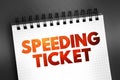 Speeding ticket - a ticket issued for driving above the speed limit, text on notepad concept background Royalty Free Stock Photo