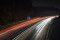 Speeding traffic on M40 motorway leaves light trails from fast moving cars. Royalty Free Stock Photo