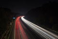 Speeding traffic on M40 motorway leaves light trails from fast moving cars. Royalty Free Stock Photo