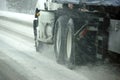 Speeding truck wheels on icy road Royalty Free Stock Photo