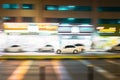 Speeding White Car Fast Driving In City Street. Motion Blur Background Royalty Free Stock Photo