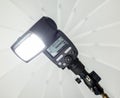 Speedlight with umbrella Royalty Free Stock Photo