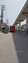 speedo bus service and orange train track in Lahore Pakistan.