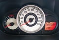 Speedometer on a car dashboard with 90,890 miles on the odometer / fuel 211 .km Royalty Free Stock Photo