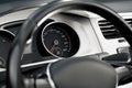 Speedometer on car dashboard, view through steering wheel Royalty Free Stock Photo