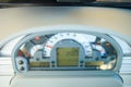 speedometer on instrument panel in tractor cabin