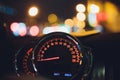 Speedometer scoring high speed in a fast motion. Sporty Car Dashboard Instruments illuminated at night. Rev counter Royalty Free Stock Photo