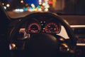 Speedometer scoring high speed in a fast motion. Sporty Car Dashboard Instruments illuminated at night. Rev counter Royalty Free Stock Photo