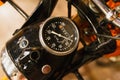 Speedometer on a vintage orange motorcycle. Royalty Free Stock Photo
