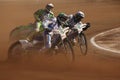 Speedway riders compete on track in Pardubice, Czech Republic.