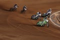 Speedway riders compete on track in Pardubice, Czech Republic.