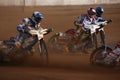 Speedway riders compete on track in Pardubice, Czech Republic.