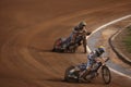 Speedway riders compete on track in Pardubice, Czech Republic.