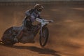 Speedway riders compete on track in Pardubice, Czech Republic.