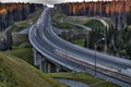 Speedway in Russian forest at sunset. Royalty Free Stock Photo