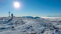 Speikkogel - A man wearing snow shoes standing at the peak of Speikkogel in Austrian Alps. The whole slope is covered with snow