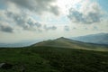 Speikkogel - A panoramic view on the distant Grosse Speikkogel in Austrian Alps. The mountains around are lush green.