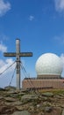 Speikkogel - A wooden cross on top of Grosse Speikkogel, Austrian Alps. There is a meteorological station behind it,