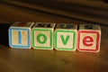 Spelling love with toy blocks Royalty Free Stock Photo