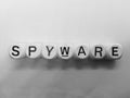 Spelling of spyware using wooden dice Royalty Free Stock Photo