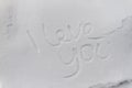 Writing text LOVE YOU on the snow Royalty Free Stock Photo