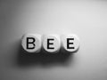 Word bee spelled on dice Royalty Free Stock Photo