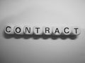 Word contract spelled on dice