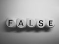 Word false spelled on dice Royalty Free Stock Photo