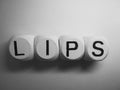Word lips spelled on dice Royalty Free Stock Photo