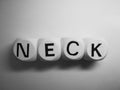 Word neck spelled on dice Royalty Free Stock Photo