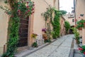 Traditional italian medieval alley and buildings in the historic center of beautiful town of Spello, in Umbria Region, Italy Royalty Free Stock Photo