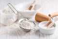 Spelt flour, sugar with baking ingredients and kitchen utensils Royalty Free Stock Photo