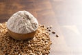 Spelt Flour in a Wooden Bowl on a Wooden Butchers Block Royalty Free Stock Photo