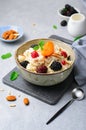 Spelt Porridge with Fruits, Berries, and Nut Topping, Healthy Breakfast or Snack