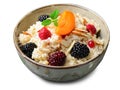 Spelt Porridge with Fruits, Berries, and Nut Topping, Healthy Breakfast or Snack on White Background