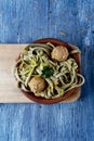 Spelt tagliatelle with kale and vegan meatballs