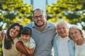 Spend life with people who make you feel loved. a happy family of three generations spending quality time together in Royalty Free Stock Photo