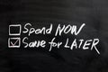Spend now or save for later Royalty Free Stock Photo