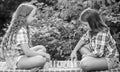 Spend time together. family time. two concentrated girls play chess. chess playing sisters. skilled children. turn on Royalty Free Stock Photo