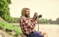 Spending carefree time. hipster man with beard use professional camera. photographer retro camera. journalist is my