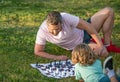 spending time together. strategic and tactic. tutorship. dad and child play logic game.