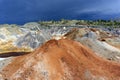 Spent clay quarry with multi-colored slopes Royalty Free Stock Photo