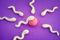 Sperm cell is going  to fertilize an egg Royalty Free Stock Photo