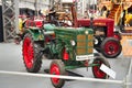 SPEYER, GERMANY - OCTOBER 2022: green red HANOMAG R 16 B 1952 retro tractor in the Technikmuseum Speyer