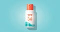 SPF 30 sunscreen bottle with orange cap on light blue background Royalty Free Stock Photo