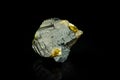 Sphalerite yellow crystal (cleiophane) isolated on black background