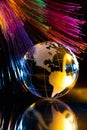 Glass Globe against Fiber Optic Background Royalty Free Stock Photo