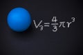 Sphere and mathematical formulas on blackboard