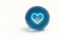A sphere with a neon heart inside, a symbol of digital empathy. Space for text. Royalty Free Stock Photo