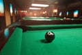 Sphere number 8 opposite to a billiard pocket Royalty Free Stock Photo